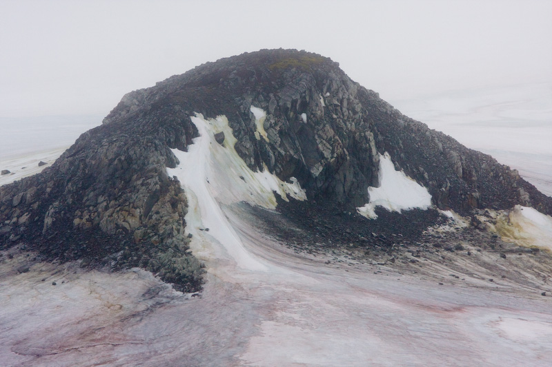 Small Peak Jutting Through Ice